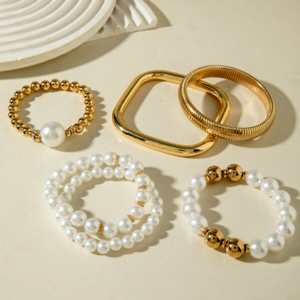 Wholesale Vintage Bracelet Layered With A Pearl Bracelet.