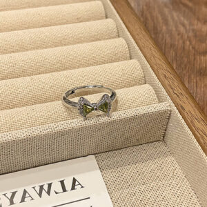 No. 11 [bow tie open ring]