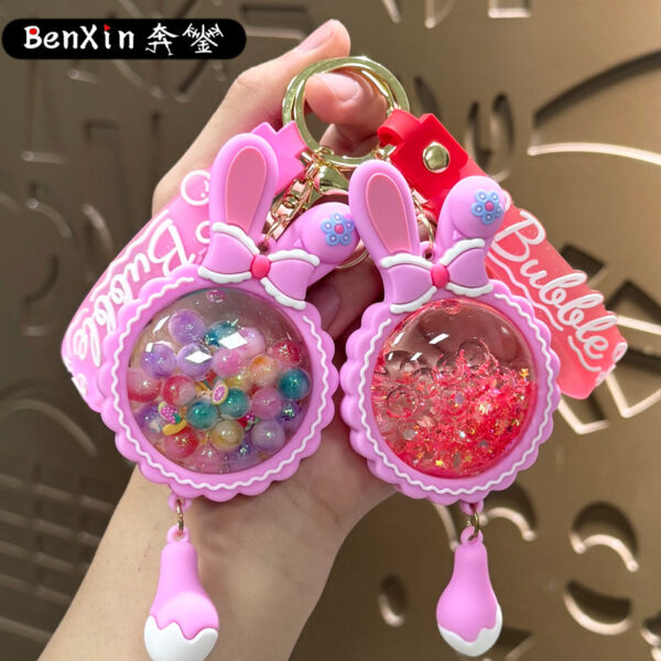 O1CN01E1lWUE1Tybomewe0b_2208062092451-0-cib Wholesale Acrylic Liquid Sand Bunny Ear Keychain