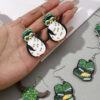 O1CN01EGZgwv2KAqGmnYJOc_2209316649517-0-cib Wholesale St. Patrick's Day animal lucky grass rainbow wooden earrings