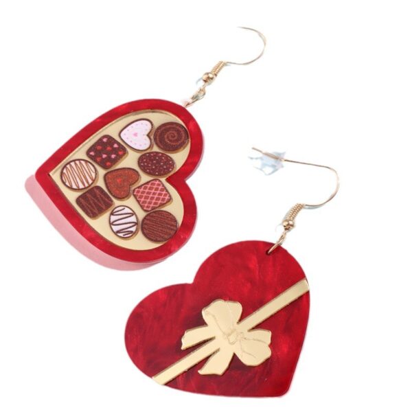 Wholesale Valentine's Day heart-shaped earrings in a rocket-shaped gift box wine red color