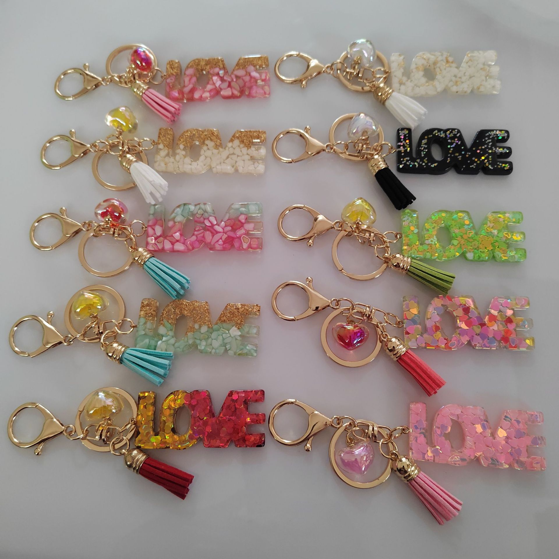 Wholesale Letter LOVE Tassel Sequin op Glue Resin Pendant Keychain