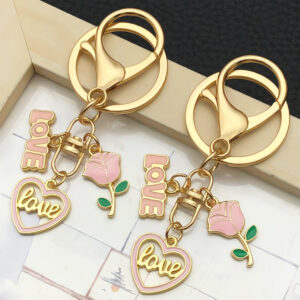 O1CN01ELMfPA2Kpbh639a0r_2217654629606-0-cib Wholesale Valentine's Day Pink Love Heart Rose Keychain