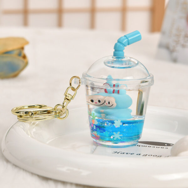 Wholesale Oil-filled acrylic doll cylindrical cup with flowing sand bottle keychain
