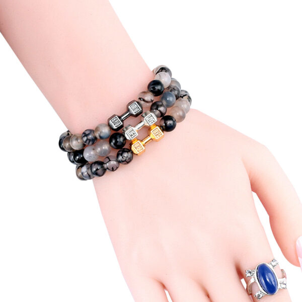 Wholesale elastic line beaded black dragon pattern bracelet alloy
