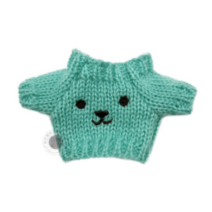 Green smiley face pattern sweater