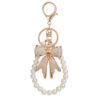 O1CN01ErCPrP1PCHcCRYbrR_2218535611804-0-cib Wholesale Diamond studded bow chain pearl bead keychain