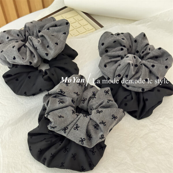 Wholesale Black polka dot bow with heart-shaped elastic headband