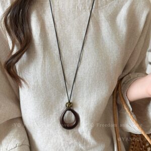 Brown hollow water drop long necklace