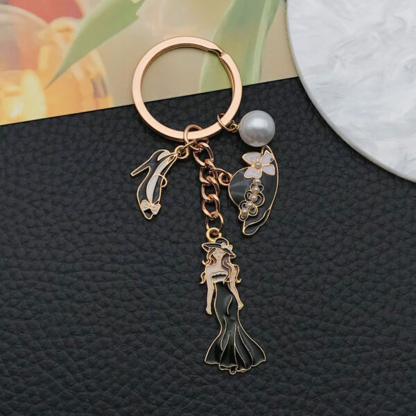 O1CN01FQhvk42Kpbd3UzAsm_2217654629606-0-cib Wholesale Cross-border oil-dripping black princess dress model small fragrant style hat high heels keychain exquisite jewelry key chain