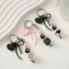 Wholesale Heart shaped bow square beads black pink keychain