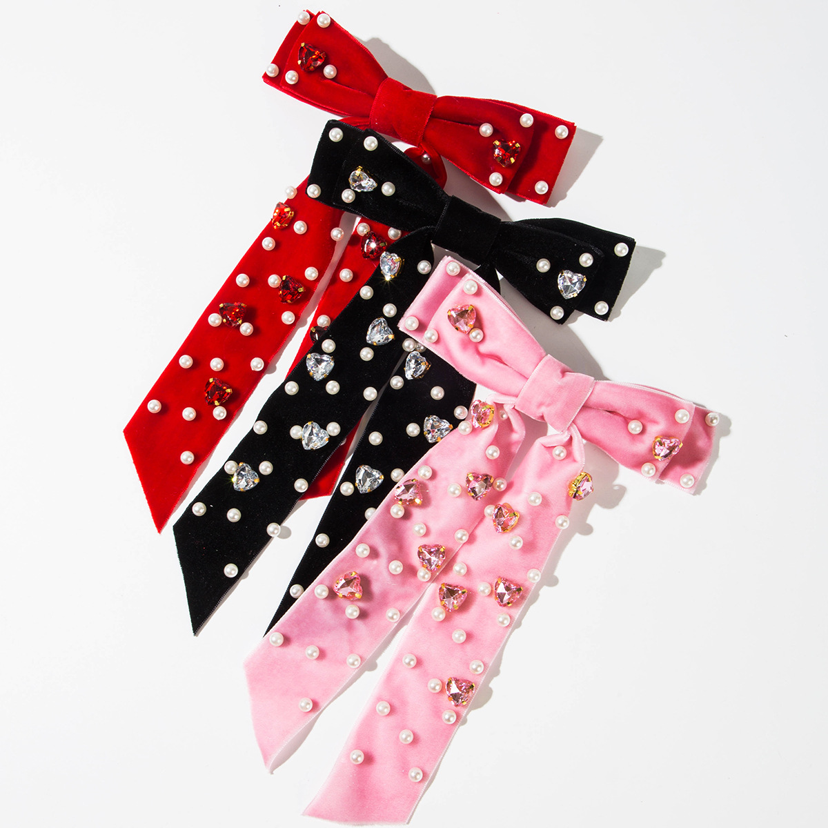 Wholesale Veet fabric multi-layer bow inlaid with heart-shaped pearl hair clip
