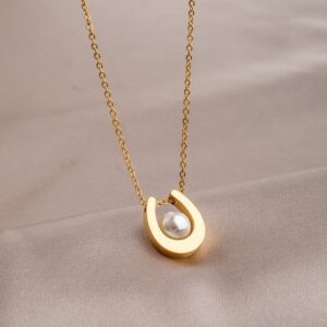 Gold u-shaped pearl necklace