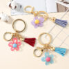 Wholesale Cute hollow sunflower tassel keychain