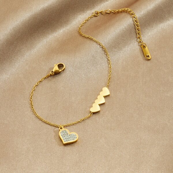Wholesale Gold-plated Stainless Steel with Three Heart Charms and Rhinestones Bracelet