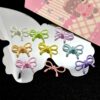 Wholesale Cute Ins Alloy Cut Out Rope Bow Separated Beads DIY