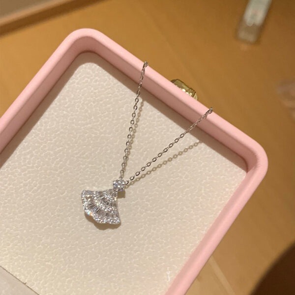 Wholesale Silver skirt with hollowed out umbrella skirt necklace