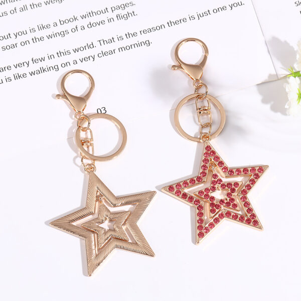 Wholesale Five pointed star hollow diamond inlaid metal keychain
