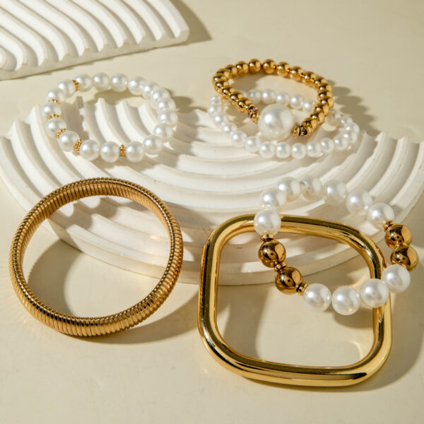 Wholesale Vintage Bracelet Layered With A Pearl Bracelet.