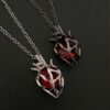 O1CN01HWNXLy1l7d8Y0IffQ_2216037694772-0-cib Wholesale Gothic dark style hollow heart red blue glass heart pendant necklace