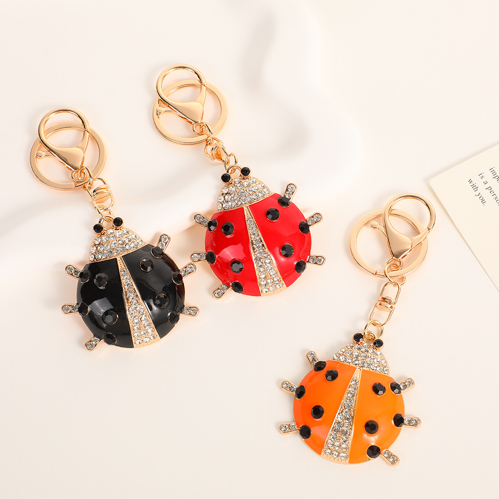 Wholesale Colorful ipping Oil Sn Star Ladybug with Diamond Set Metal Keychain