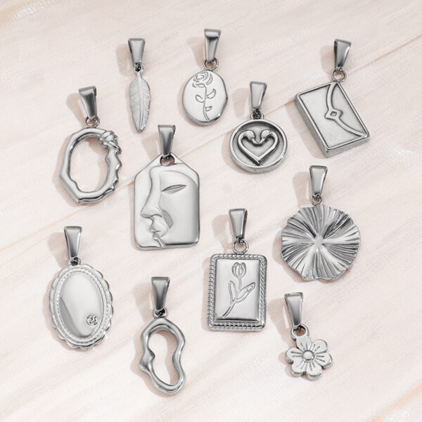 Wholesale Retro flower heart-shaped hollow geometric stainless steel pendant
