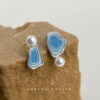 Wholesale Blue Salt Lake series asymmetrical silver needle earrings