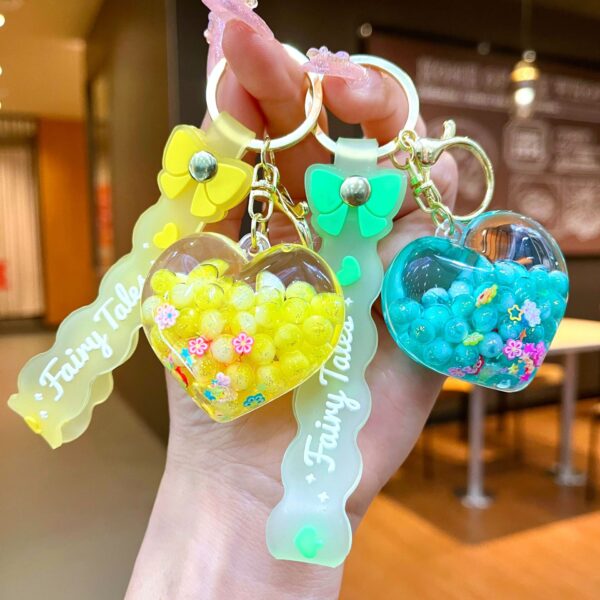 Wholesale Creative Summer Colorful Sand Heart Glow-in-the-Dark Keychain