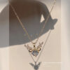 O1CN01Hv25Wk1E6ofxeNmMz_2207814330303-0-cib Wholesale Titanium steel zircon necklace female deer