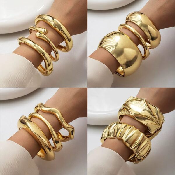 O1CN01I6qcbd1lWouGBzvWv_2218670844827-0-cib Wholesale Golden wide edged wave band exaggerated bracelet