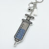 Wholesale Diamond-studded syringe keychain fashionable tassel pendant