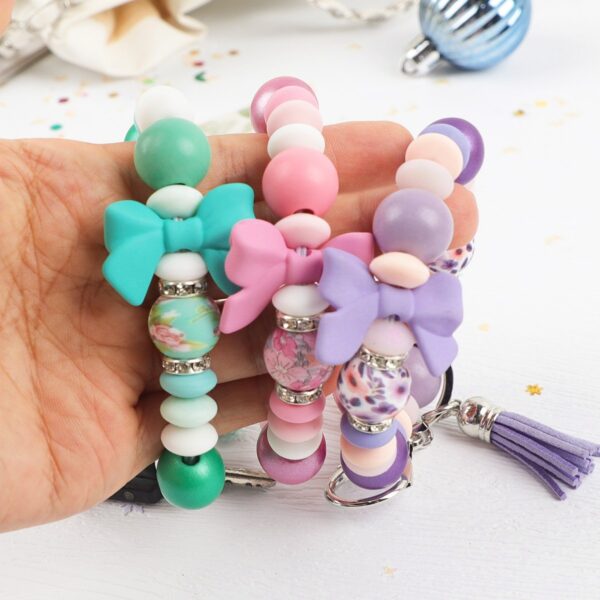 Wholesale silicone bead keychain pendant bag charm bow accessory