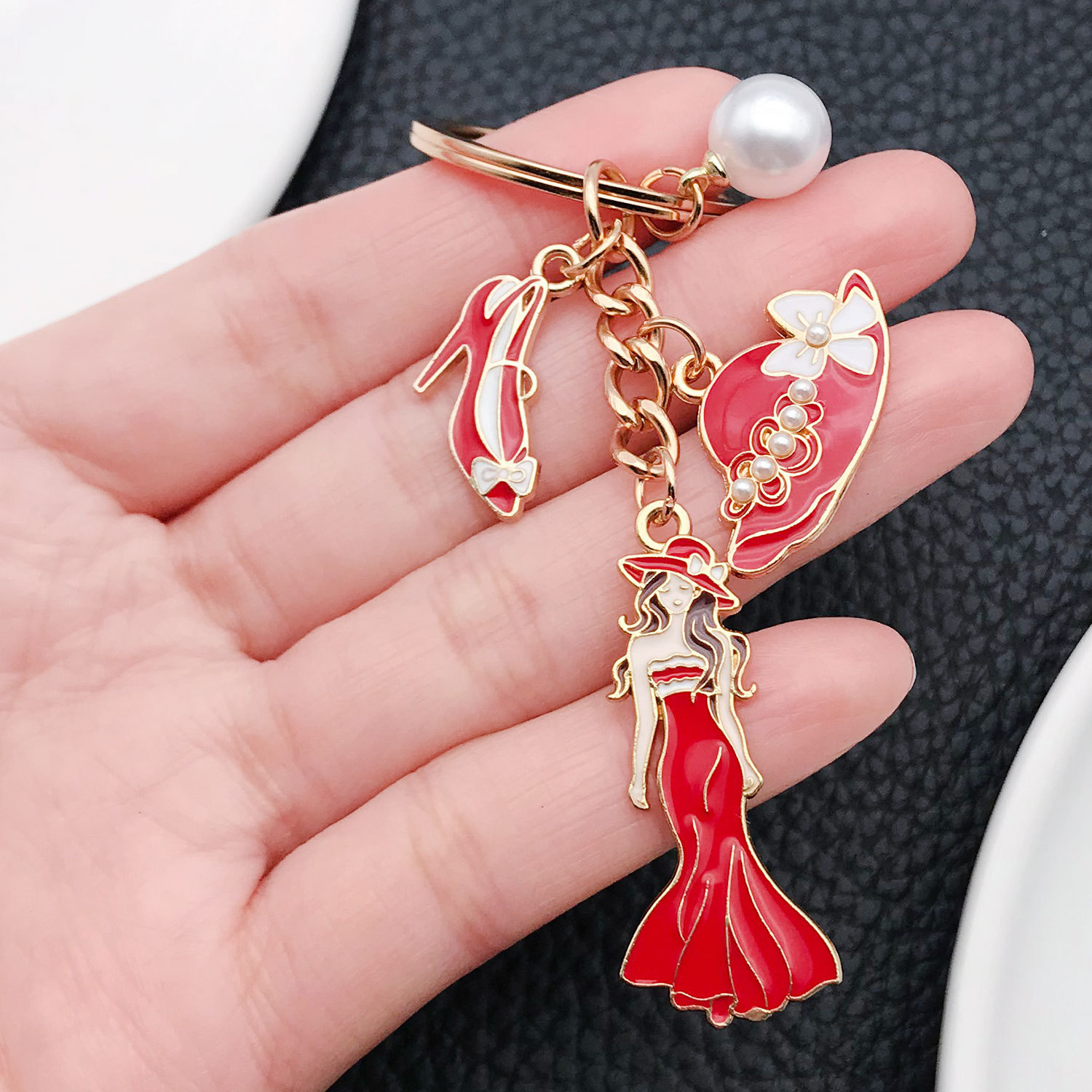 Wholesale Cross-border oil op red alloy princess ess model hat high heels pearl keychain niche jewelry pendant