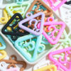O1CN01INVarp20wfS0jFIfb_2218603856914-0-cib Wholesale Corner question mark perforated acrylic beads