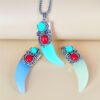 O1CN01IStDIO2IVKiTq7YeU_3919529291-0-cib Wholesale Turquoise Luminous Wolf Tooth Stainless Steel Chain Men's Pendant