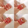 O1CN01IX7E081FFoUuphfiD_2217548420458-0-cib Wholesale Red diamond studded heart-shaped soft ceramic bracelet set