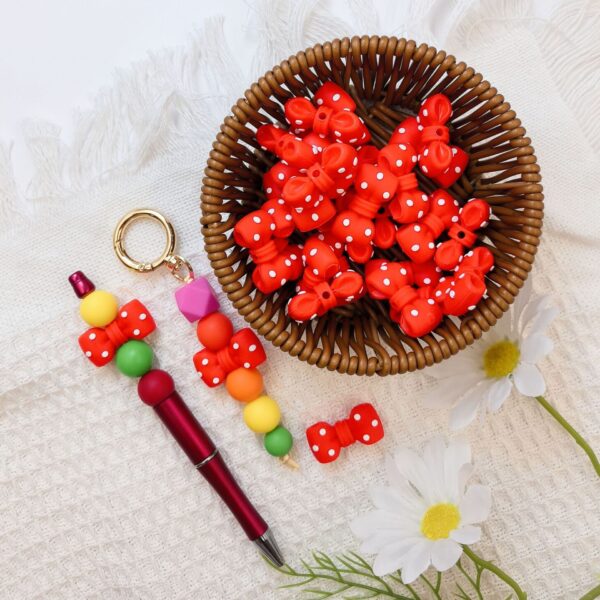 O1CN01J6bUYW2FO3h7nY1LH_2216349148869-0-cib Wholesale 10pcs 3D Black Dot Red Dot Bow New Three-dimensional Silicone Cute Cartoon DYI Beads