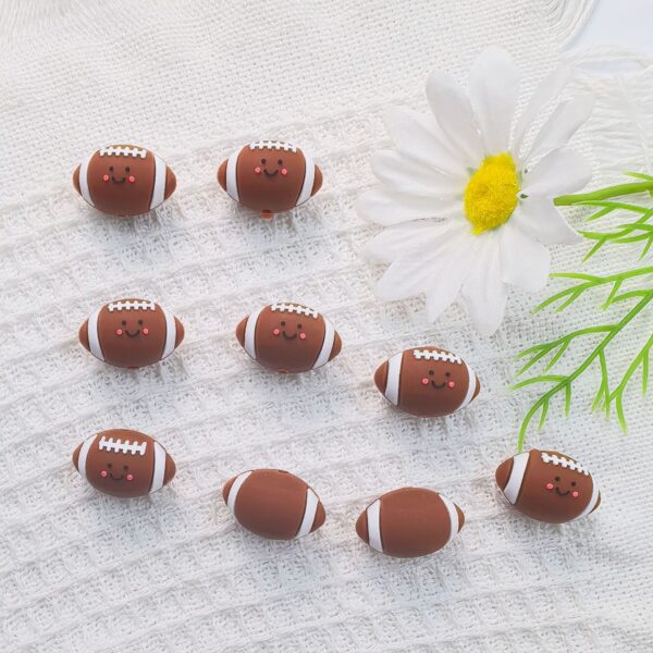 O1CN01J8SQ7R2FO3hPrK1uA_2216349148869-0-cib Wholesale 10pcs 3D Three-dimensional Silicone Cute Cartoon Rugby DIY Beads