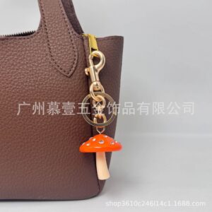 Orange with white mushrooms (rose gold hardware)