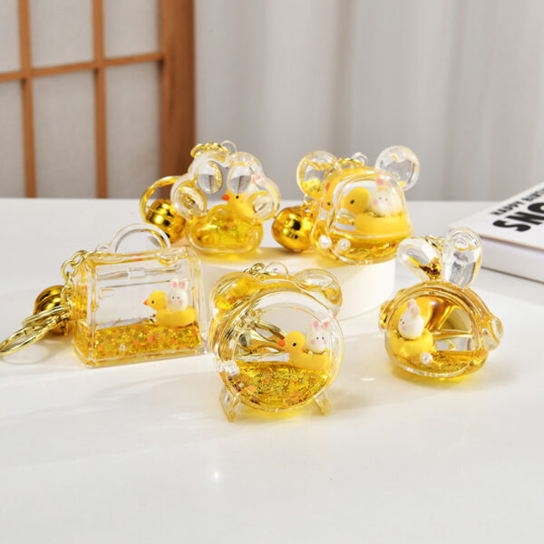 Wholesale Acrylic rabbit oil flow sand bottle keychain