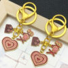 Wholesale Valentine's Day Oil Dripping Red Sprinkled Gold Keychain