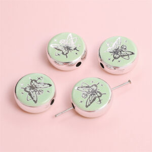 Flat disc-butterfly rose 18mm aperture about 2.5mm green / 2/bag