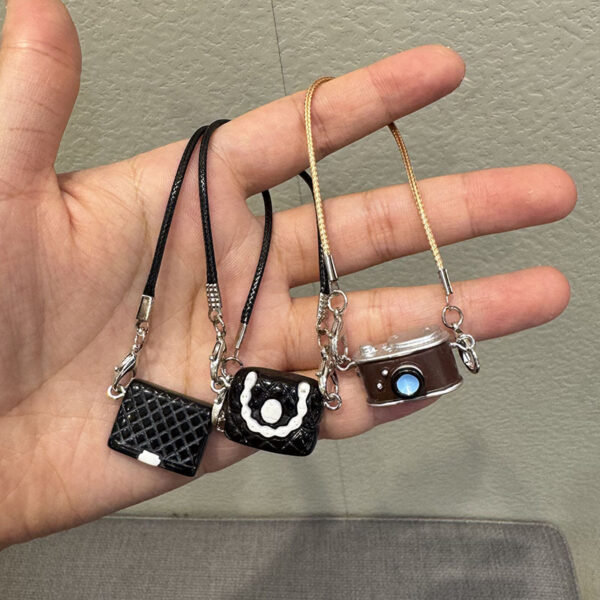 O1CN01KNfJpb29F0C8hD9Ci_2216239028037-0-cib Wholesale Mini Model Camellia Black and White Bag Doll Accessories