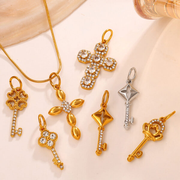 Wholesale Stainless steel gold-colored diamond-studded key cross pendant