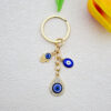 Wholesale Heart-shaped palm water droplet Devil's eye keychain