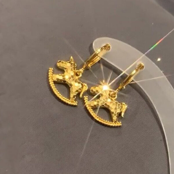 Wholesale Golden crushed ice rocking horse earrings