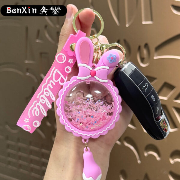 O1CN01Kq8Nqw1Tybolq9Wd0_2208062092451-0-cib Wholesale Acrylic Liquid Sand Bunny Ear Keychain