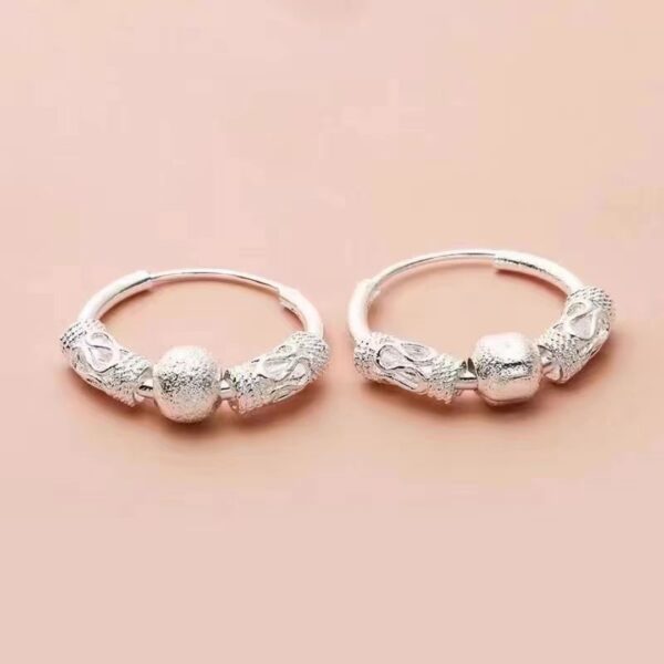 O1CN01KwN1Kd1hR5OxSNoSj_2208074034273-0-cib Wholesale Rotatable Earrings Feminine Niche Design Fortune Transfer Simple Earrings