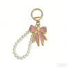 O1CN01L71CDt1PCHcKyWRng_2218535611804-0-cib Wholesale Diamond studded bow chain pearl bead keychain