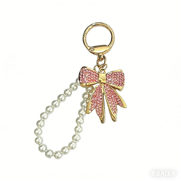 O1CN01L71CDt1PCHcKyWRng_2218535611804-0-cib Wholesale Diamond studded bow chain pearl bead keychain